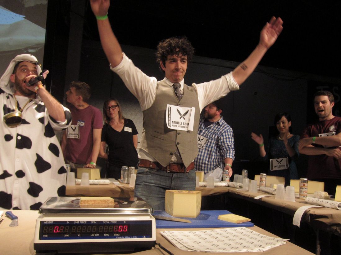Nadjeeb Chouaf of Floral Artisanal Cheese in Charlottesville correctly cuts a perfect 1/4 pound<br>